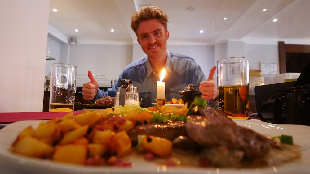 Nomadic Samuel enjoying a hearty German lunch at Lunch at Hotel zum Bär in Quedlinburg, Germany 