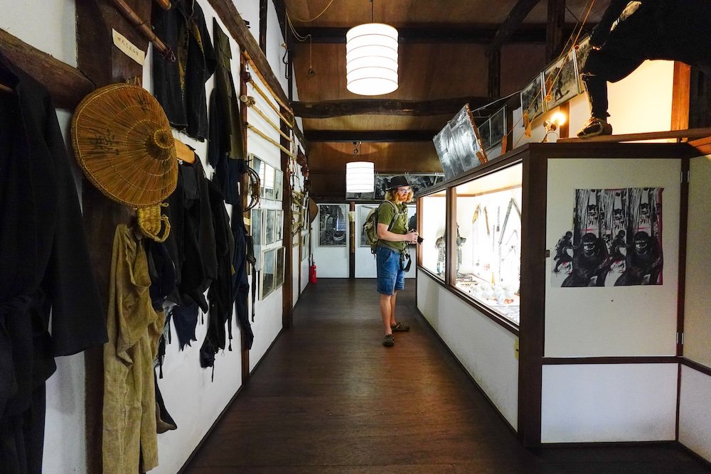 Nomadic Samuel enjoying a unique display at a museum located in Togakushi Ninja Folk Village on a day trip from Nagano city, Japan 