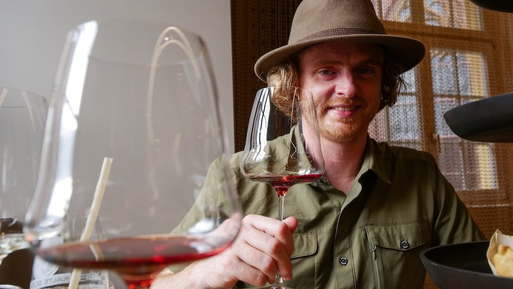 Nomadic Samuel enjoying a wine tasting in Freiburg, Germany 