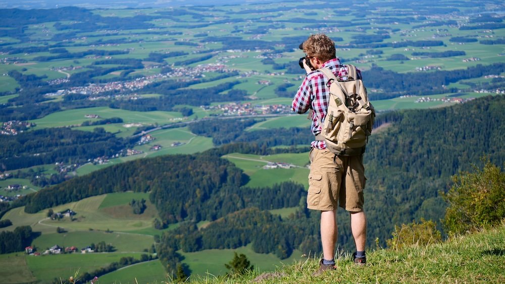 Nomadic Samuel enjoying hiking and taking photos in the Alps of Austria 