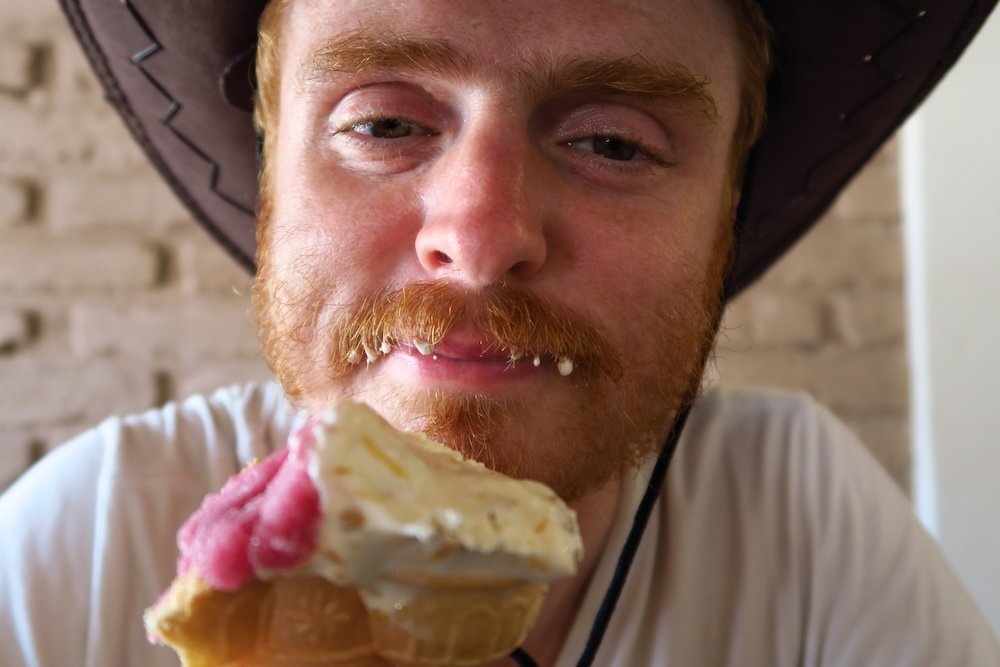 Nomadic Samuel enjoying ice cream in Salta, Argentina getting it all over his face 