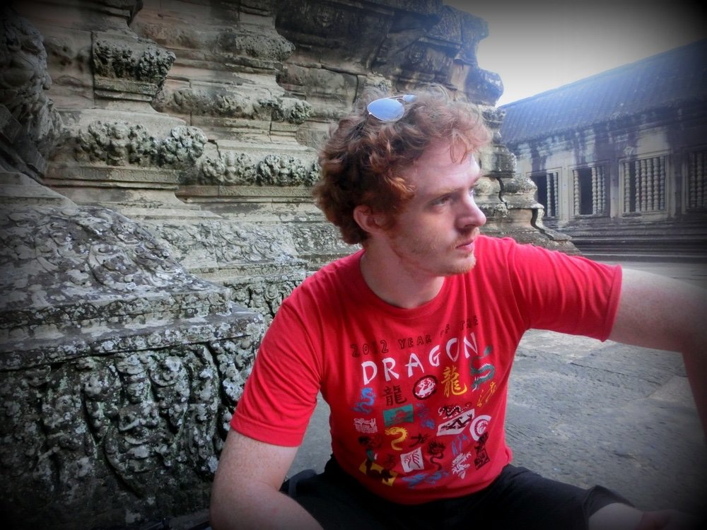 Nomadic Samuel exploring the temples of Cambodia 