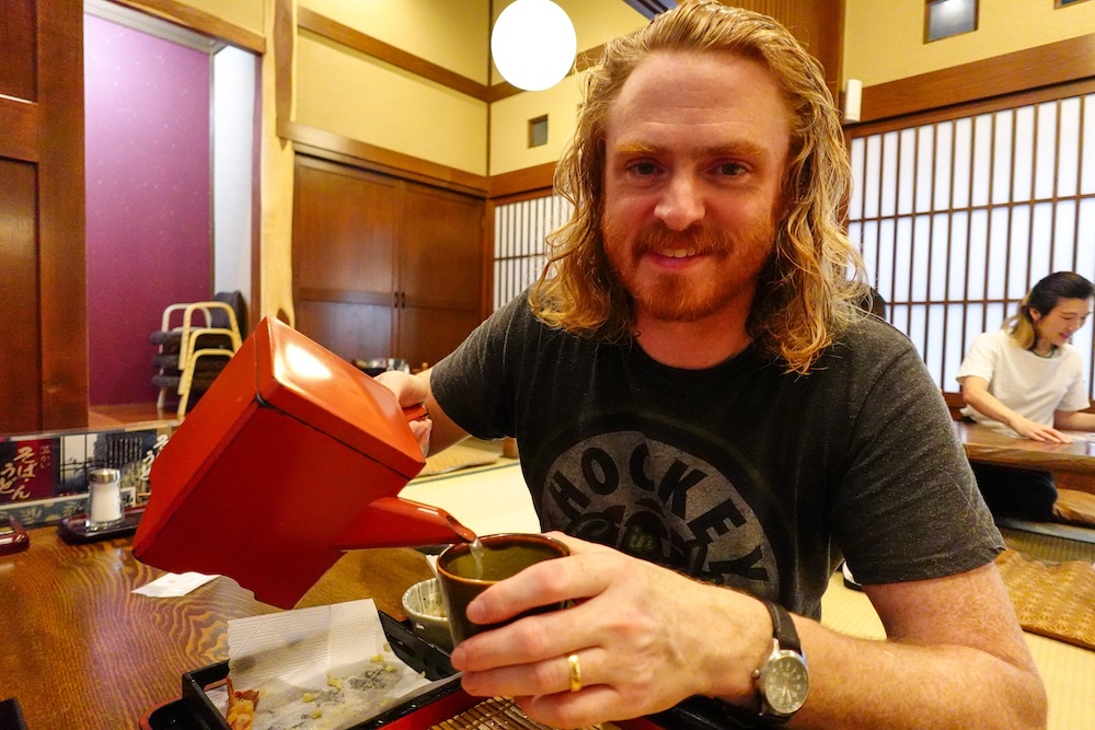 Here I Am Nomadic Samuel enjoying Japanese tea and cuisine while traveling around Japan 