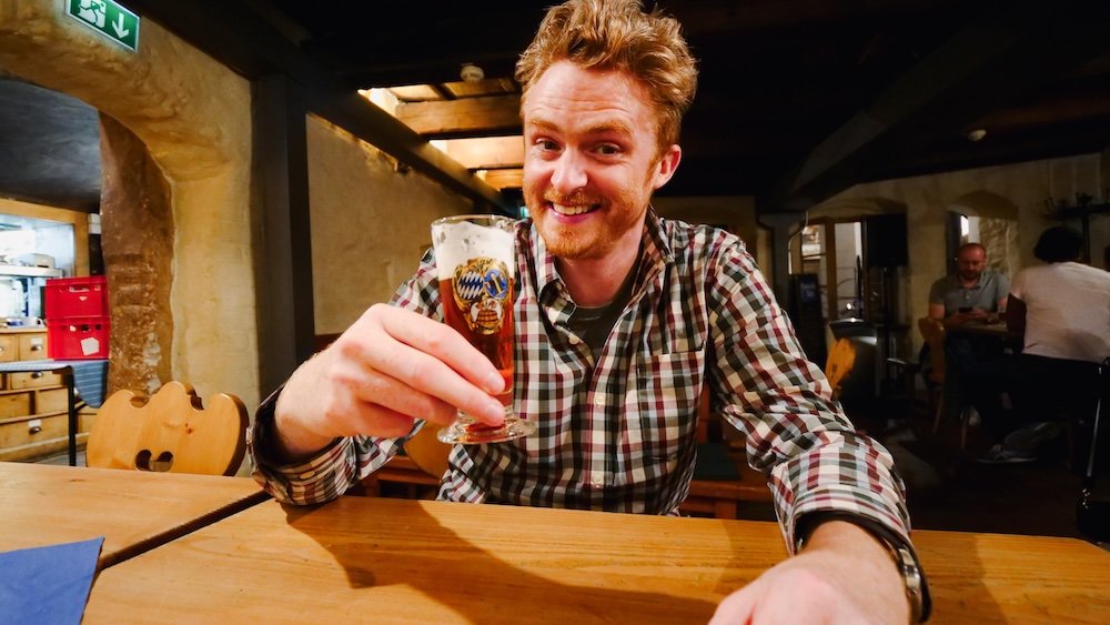 Nomadic Samuel having a blast on Bavarian beer tour in Munich, Germany 