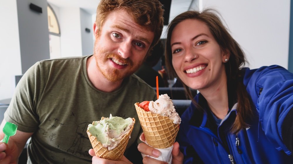 Nomadic Samuel Jeffery and That Backpacker Audrey Bergner eating delicious Polish ice cream lody in Krakow, Poland 