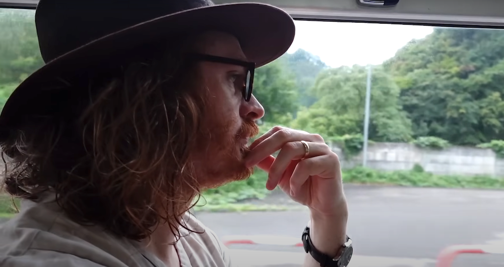 Nomadic Samuel riding the bus to Kiyotsu Gorge, Japan