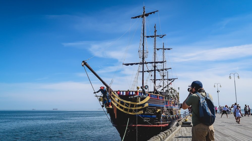 Nomadic Samuel taking photos of a neat ship in Sopot, Poland 