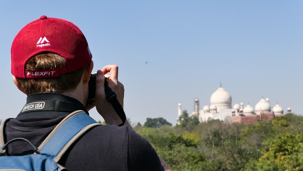 Nomadic Samuel taking photos of the Taj Mahal in Agra, India