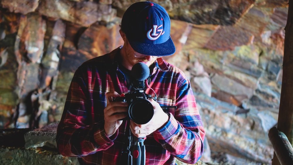 Nomadic Samuel taking travel photos and videos while traveling in Nova Scotia, Canada 