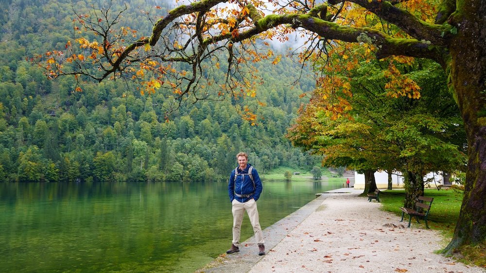 Nomadic Samuel thrilled to be visiting Berchtesgaden posing by a natural setting in Germany 