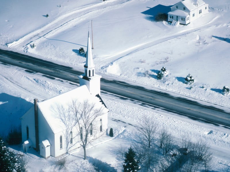 Rural church covered in snow during the wintertime - Nova Scotia, Canada 