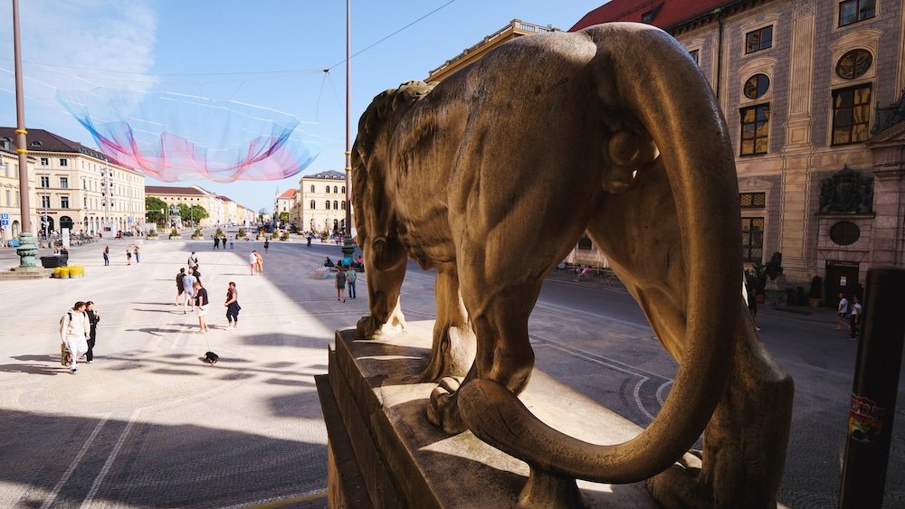 Odeonsplatz magnificent lion statue in Munich, Germany 