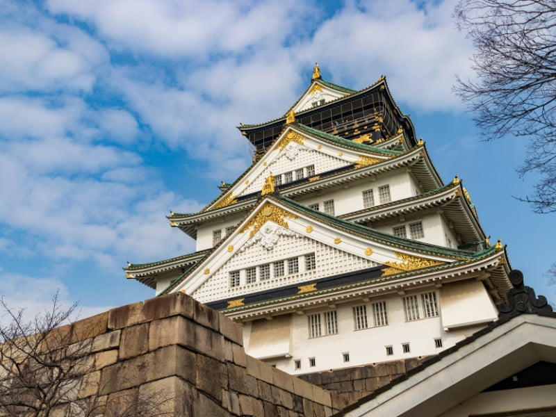 Osaka Castle in Japan is an example of a typical Japanese castle that you can visit as a tourist in Japan 