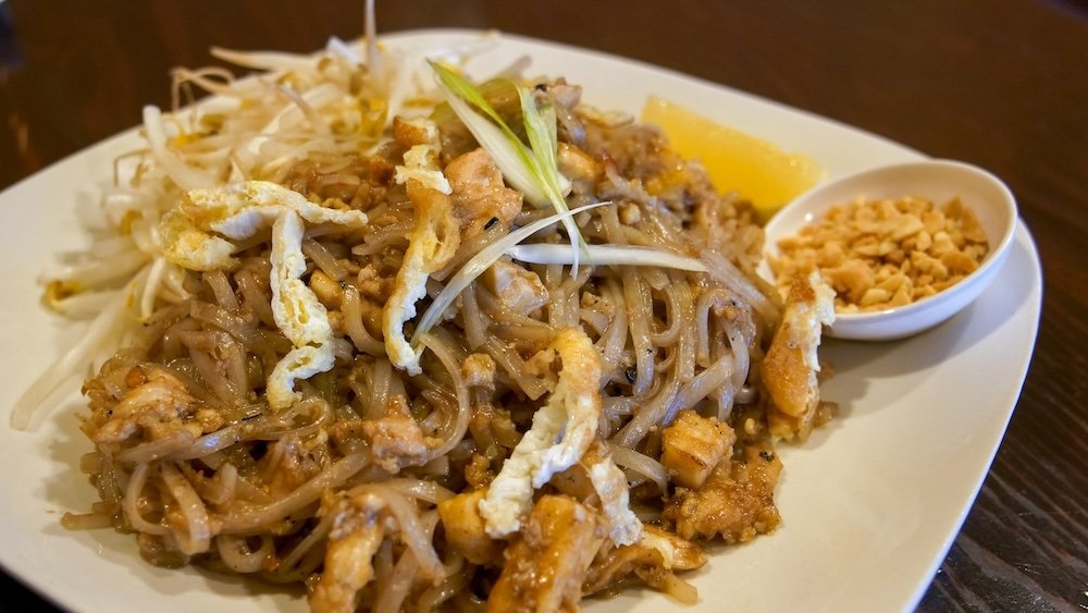Pad Thai at Family Thai Restaurant in Cranbrook, British Columbia, featuring rice noodles, chicken, egg, bean sprouts, and crushed peanuts, highlighting a satisfying and flavourful local dining option that works perfectly for lunch or dinner on a Cranbrook day trip.
