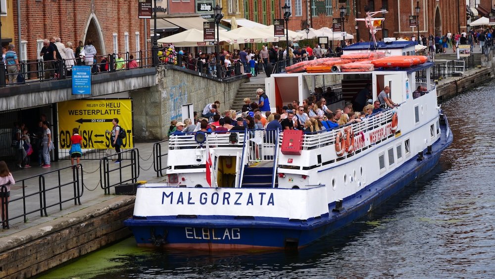 Passengers boarding a boat to take in the Motlawa River Mottlau in Gdansk, Poland