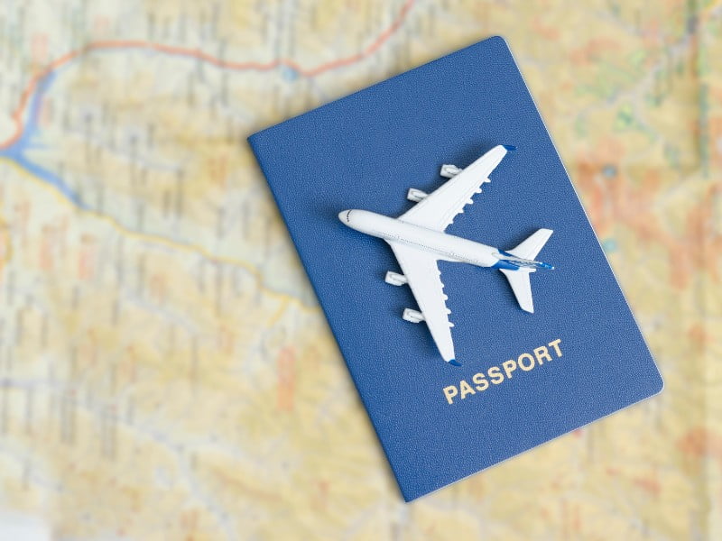Passport with airplane on top 