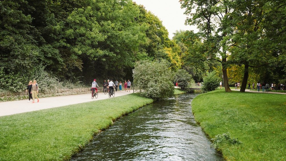 Pedestrians and bicycles at the English Garden urban park in Munich, Germany