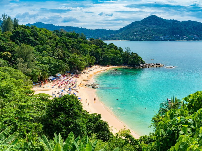 Phuket lush greenery from a high vantage point with beaches at the bottom in Thailand 