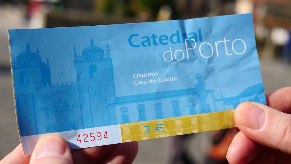 Porto Cathedral three 3 Euro ticket macro details in hand in Portugal 