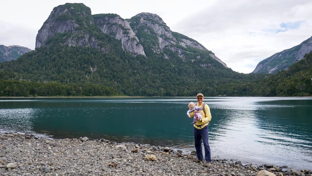 Samuel Jeffery and Aurelia Jeffery at Puerto Blest, Lake Nahuel Huapi, Río Negro Province, Patagonia Samuel Jeffery holds his daughter Aurelia Jeffery on the rocky shore of Lake Nahuel Huapi at Puerto Blest, Río Negro Province, Argentine Patagonia, with steep forested peaks rising behind them.