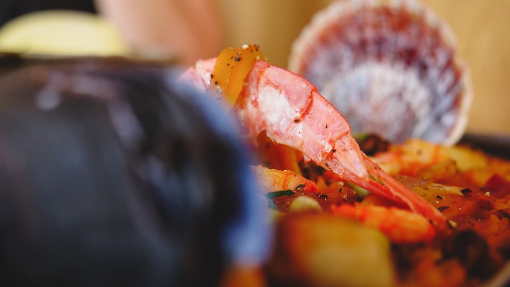 Puerto Madryn Patagonia seafood dish in Chubut Argentina featuring shrimp and shellfish from the Atlantic coast, highlighting the rich coastal cuisine served in restaurants near the historic Welsh settlement region of Puerto Madryn.