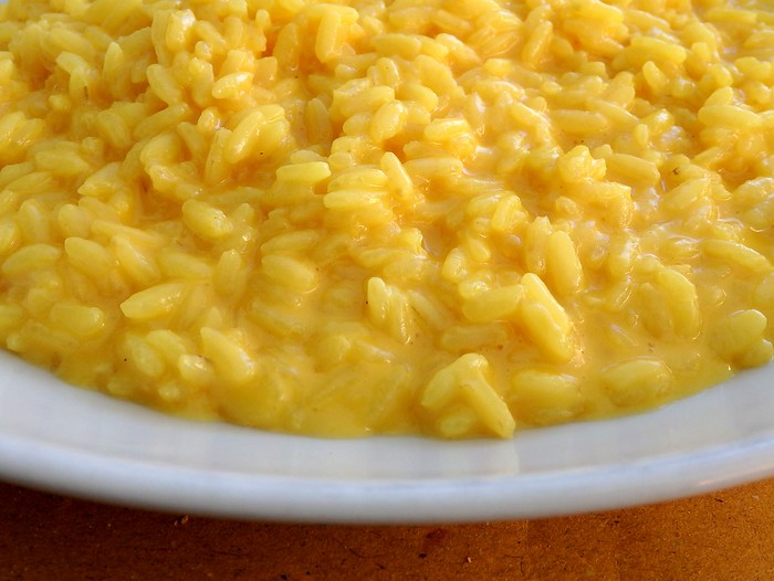 Risotto alla Milanese with lots of cheese in Milan, Italy