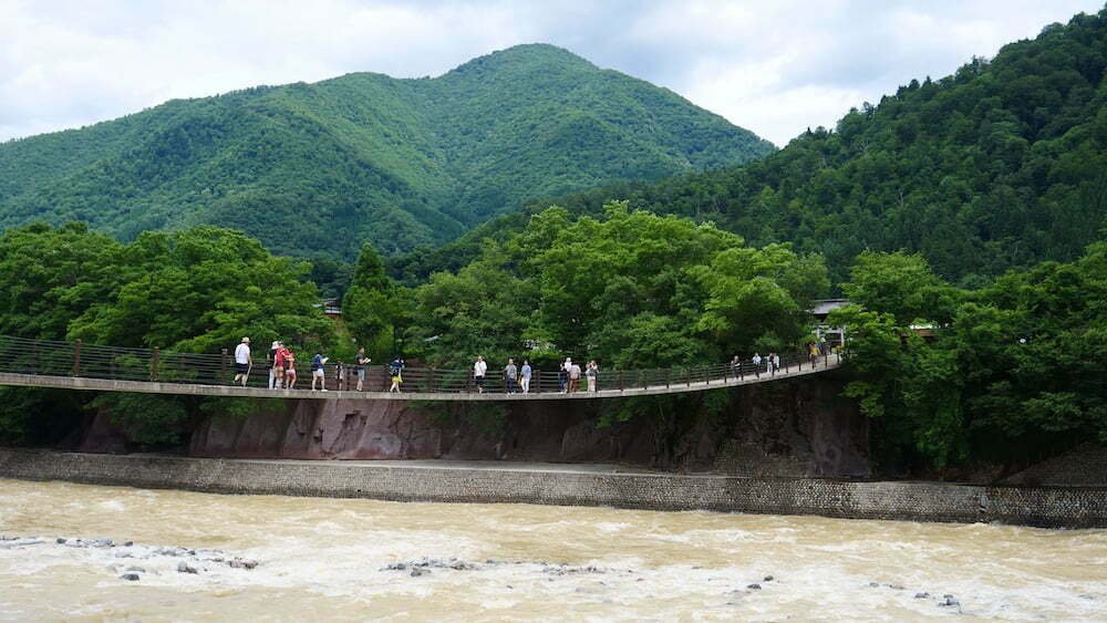 Rural Japanese bridge crossing Shirakawago, Japan 