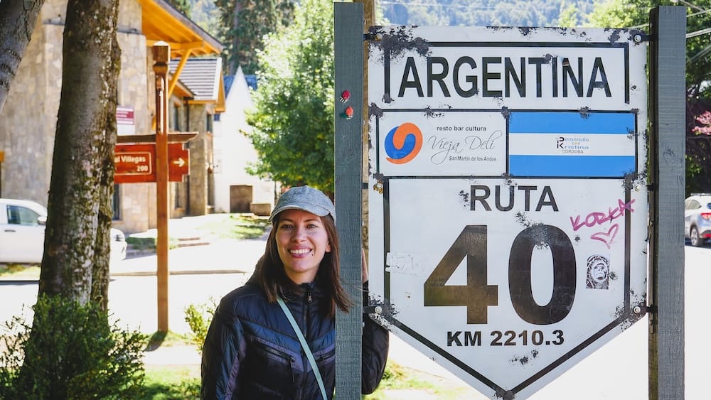 Ruta 40 Sign in San Martín de los Andes and Patagonia's Deceptive Travel Times with Audrey Bergner Ruta 40 sign in San Martín de los Andes, Neuquén, highlighting one of Patagonia’s most famous roads and the article’s bigger lesson that kilometers alone never tell the full travel-time story, with Audrey Bergner.