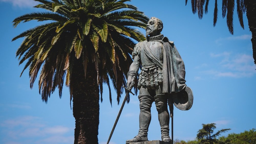 Salta distinct statue and palm trees in Argentina 