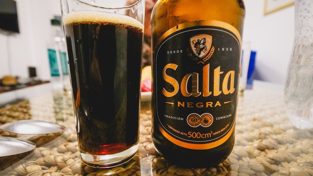 Salta Negra dark beer bottle and glass at a restaurant in Salta, Argentina 