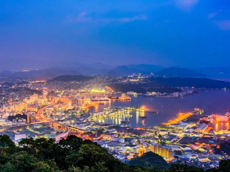 Sasebo Travel Guide: Things to do in Sasebo, Japan with aerial views of the city at night 