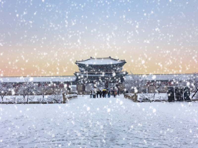 Gyeongbokgung temple during the winter with snow in Seoul, South Korea 