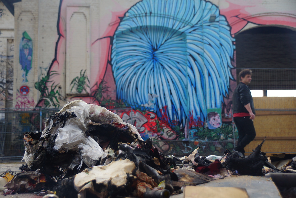 Street art and a pile of rubbish in Friedrichshain Berlin