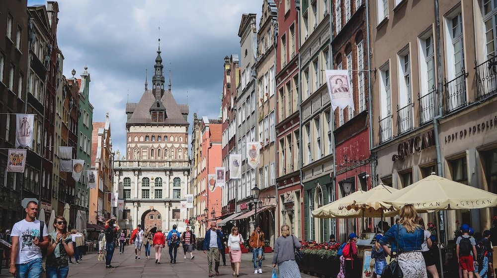 Stroll Along Long Lane Ulica Długa Langgasse with a plethora of pedestrians walking in Gdansk, Poland 