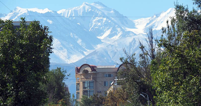 Stunning snow capped mountain views off in the distance from Bishkek, Kyrgyzstan