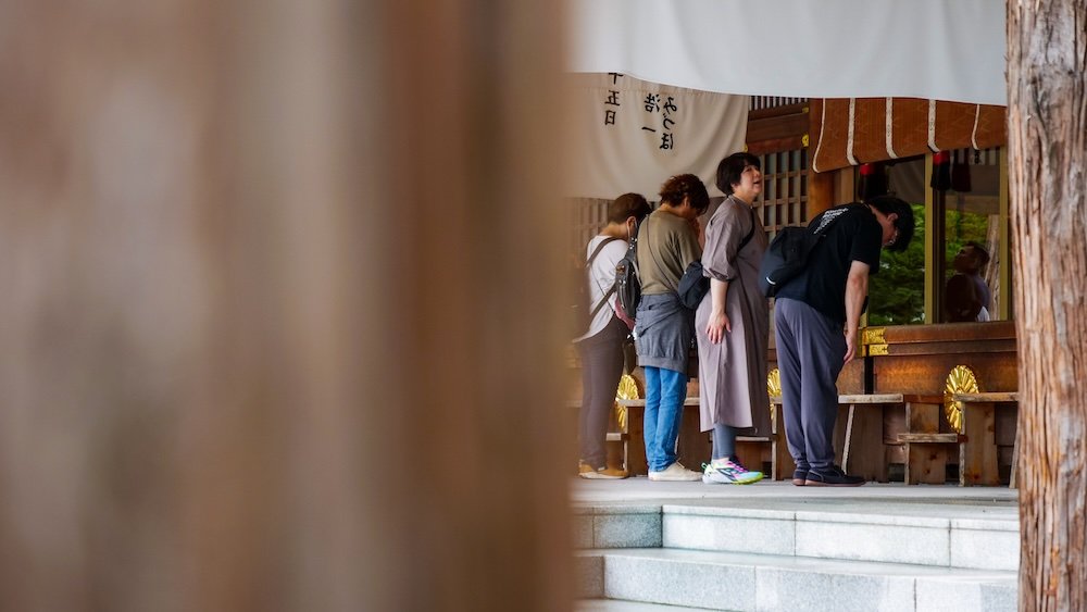 Taking candid photos at a temple in Sapporo, Hokkaido, Japan