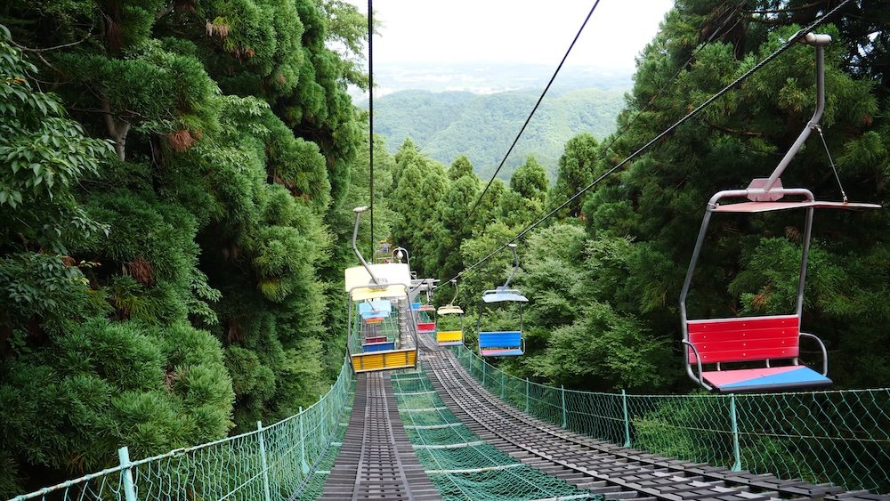 Taking the Cable Car or Lift in Mount Takao offers convenient transportation options for those who prefer a more relaxed ascent available to take you up the mountain