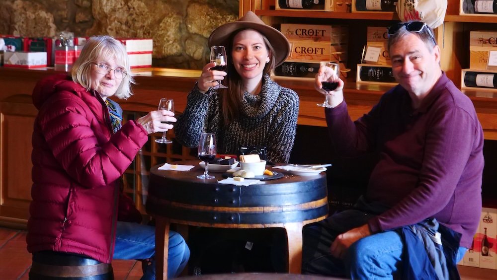 That Backpacker Audrey Bergner and Nomadic Samuel's family Mom and Dad enjoying a port wine tour in Porto, Portugal 