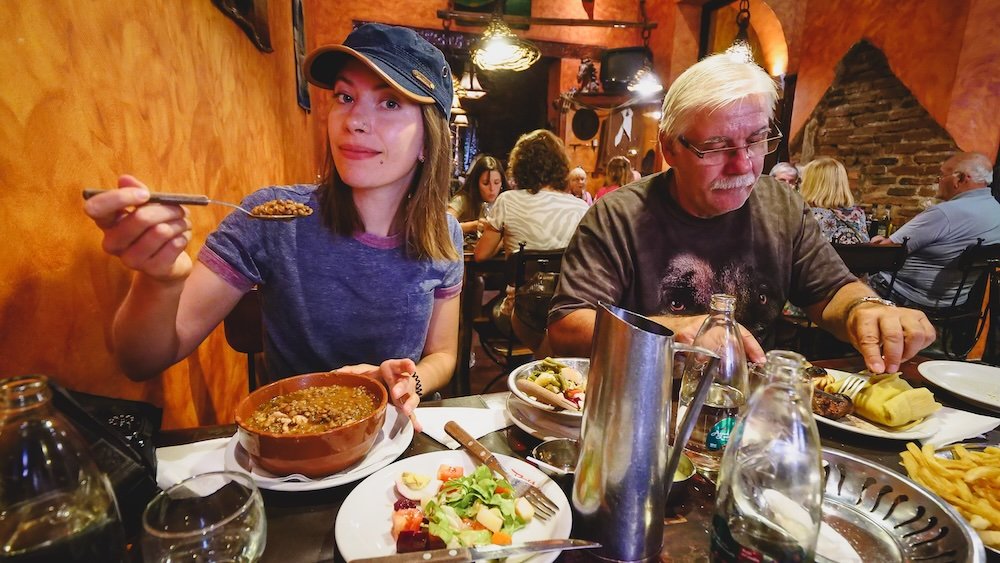 That Backpacker Audrey Bergner and Daniel Bergner enjoying traditional Argentina cuisine in Salta, Argentina