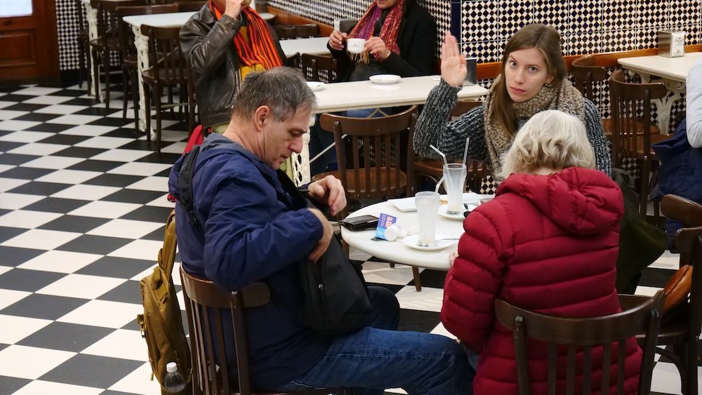 That Backpacker Audrey Bergner and Nomadic Samuel's parents enjoying food and horchata at Horchateria Santa Catalina in Valencia, Spain 