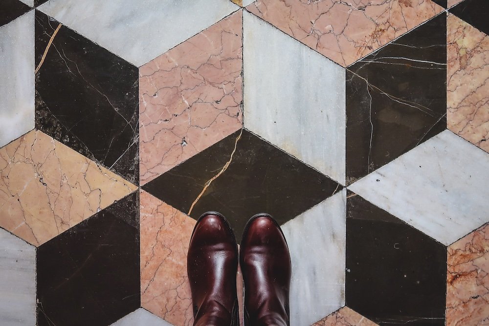 That Backpacker Audrey Bergner boots on the ground in the Old Quarter of Valencia, Spain 