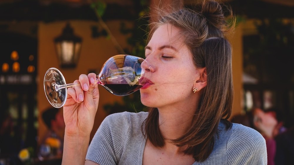 That Backpacker Audrey Bergner enjoying a sip of red wine at Bodega Piattelli in Cafayate, Salta, Argentina 