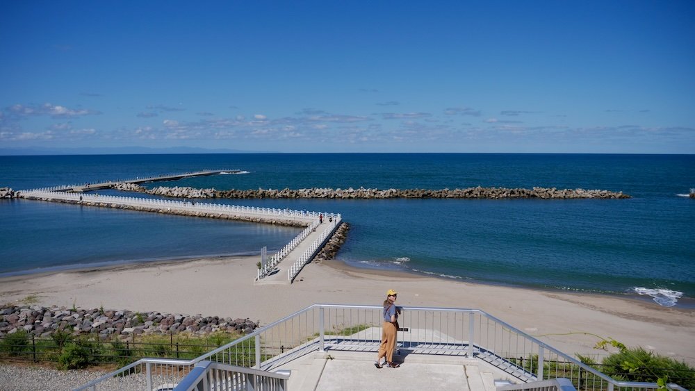 That Backpacker Audrey Bergner enjoying epic beach and coastal views from Niigata West Coast Jetty #5 