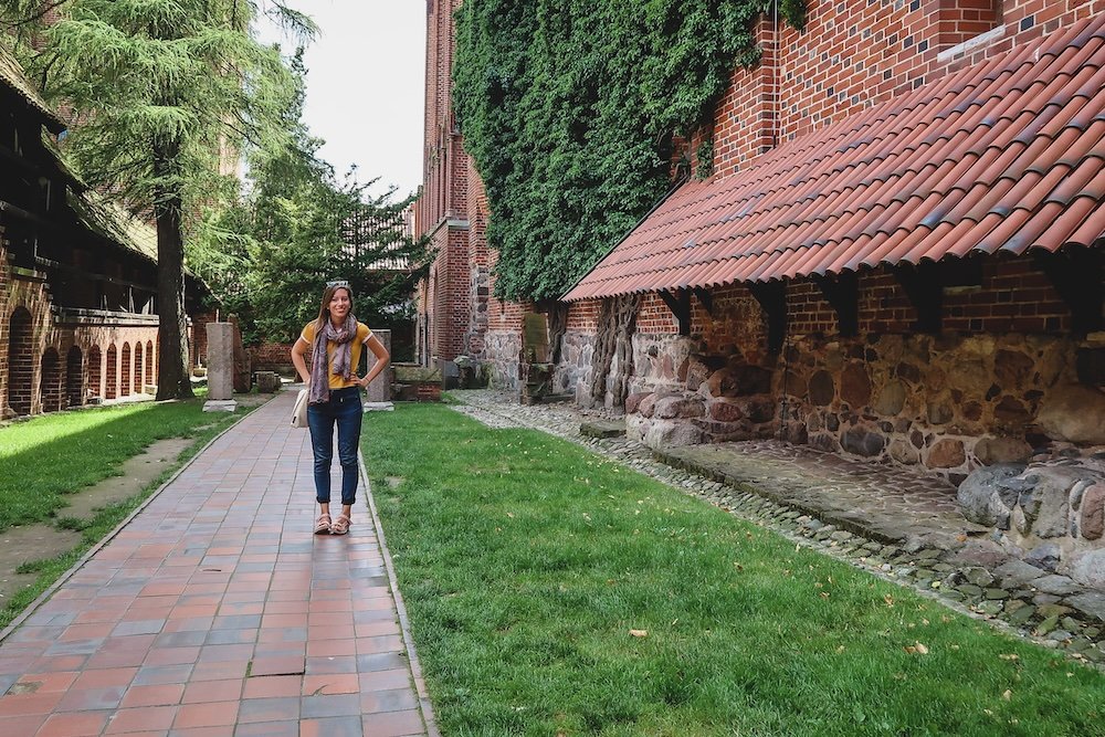 That Backpacker Audrey Bergner excited to be visiting Malbork Castle, Poland 