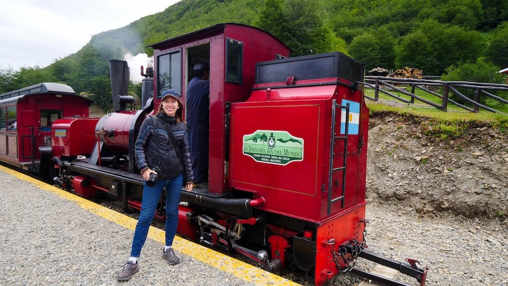 That Backpacker Audrey Bergner excited to take the train at the end of the world in Ushuaia, Tierra del Fuego, Argentina 