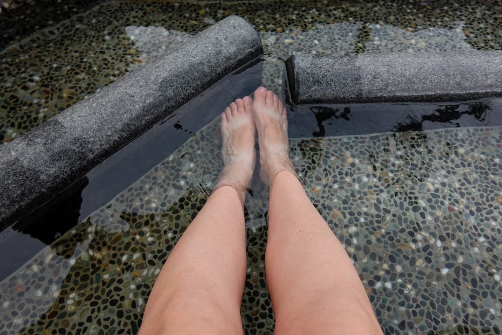 That Backpacker Audrey Bergner macro details of her foot in a foot bath in Yuzawa, Japan 