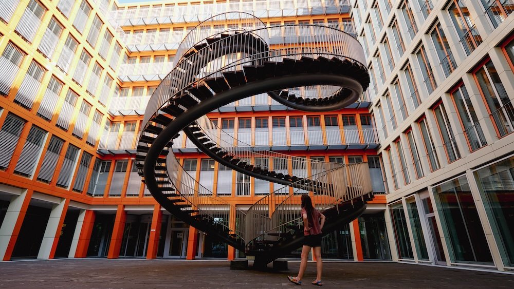 That Backpacker Audrey Bergner marvelling at the Endless Staircase in Munich, Germany 