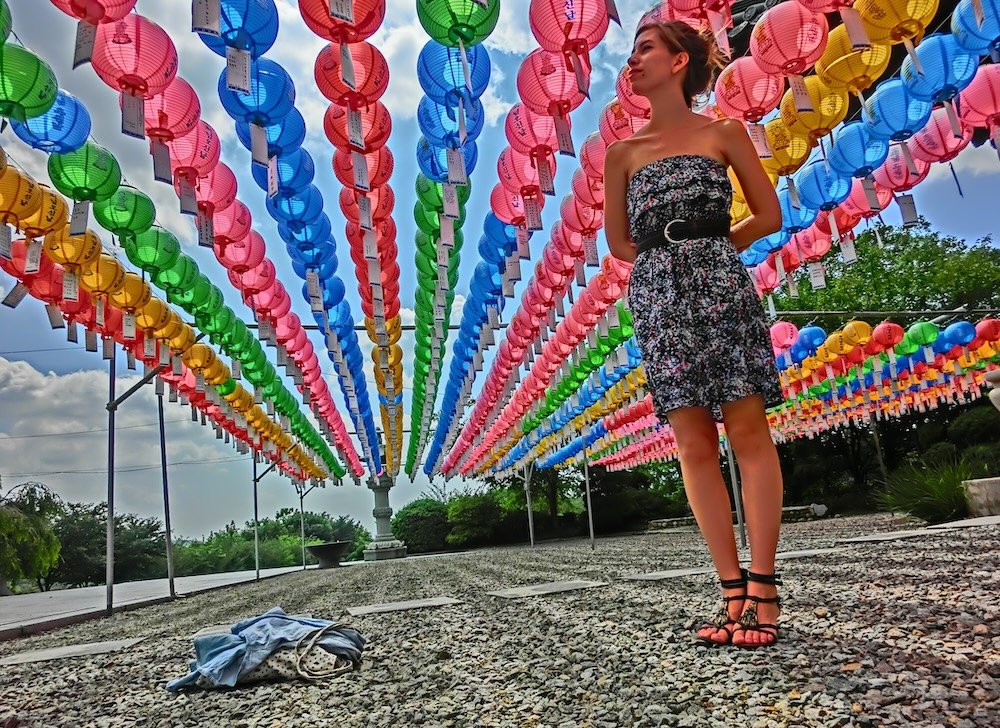 That Backpacker Audrey Bergner posing by colorful lanterns in Cheonan, Korea 