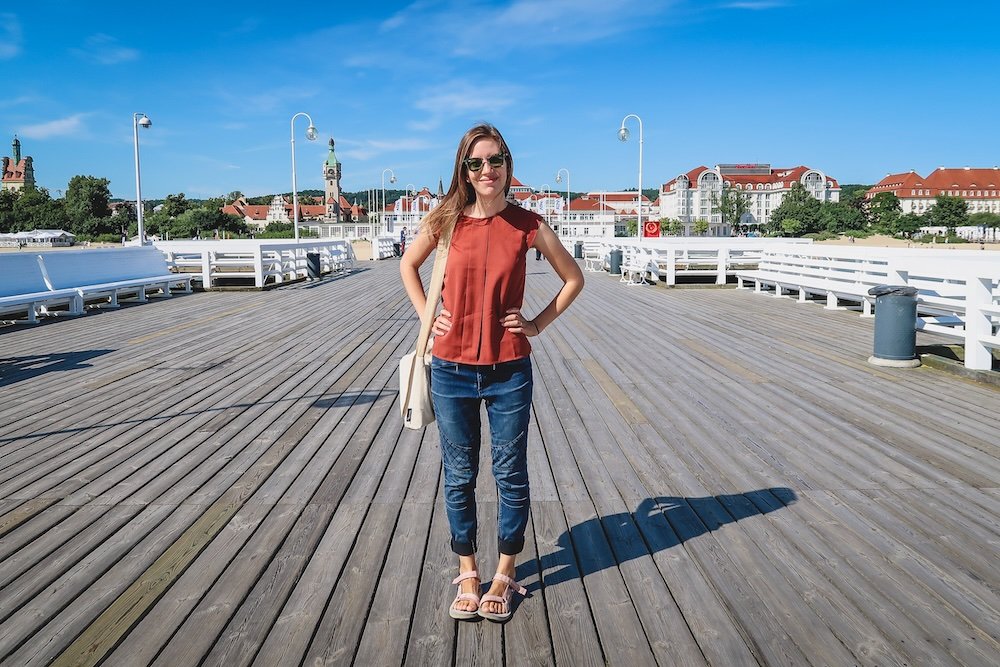 That Backpacker Audrey Bergner strolling and posing on Sopot Pier, Poland 