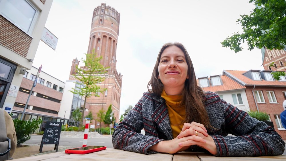 That Backpacker Audrey Bergner waiting for lunch with epic views at Friedas am Wasserturm in Luneburg, Germany